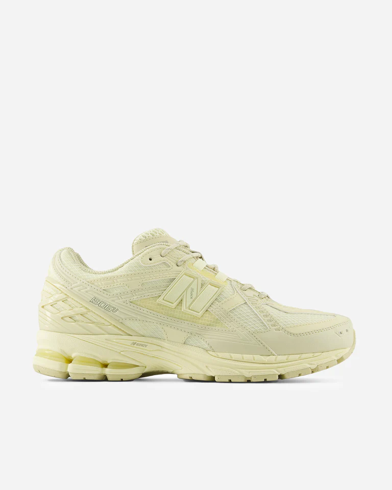 New balance white shoes price best sale